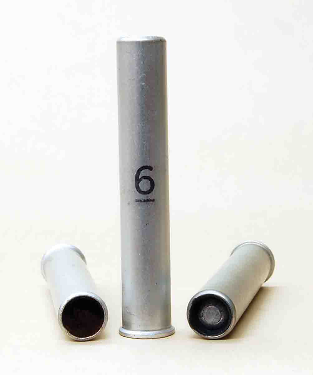 The .410 was popular for “survival guns.” These aluminum cases from the 1950s show (left to right) a roll crimp, a full-length case and the nose of a slug or roundball.